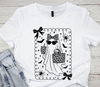 Flat lay of a white t-shirt showcasing a ready-to-press boho leopard print ghost DTF transfer with bats and spiders.