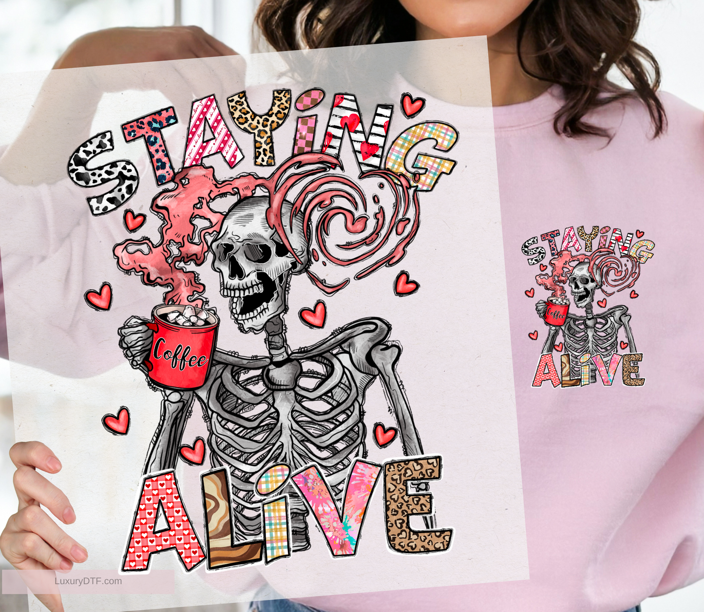 Funny illustration skeleton design with colorful text "Staying Alive" drinking his/her favorite coffee, with vapor in a shape of heart. DTF transfer ready to press, screen print transfer | Luxurydtf.com