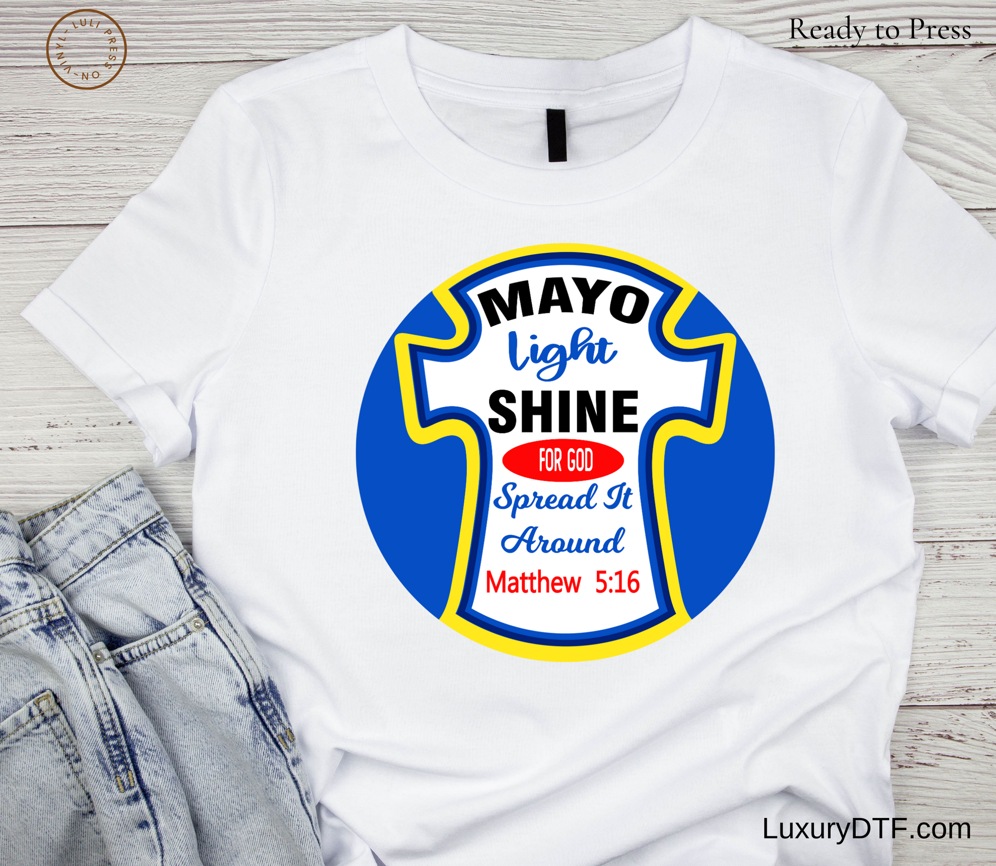 Close-up view of 'Mayo Light Shine' DTF design on white t-shirt worn by model