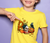 Little boy in yellow shirt adorned with colorful Halloween cartoon DTF design - LuxuryDTF.com