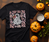 Black t-shirt with a Spooky-cute lace ghost with flowers ready-to-press DTF transfer design