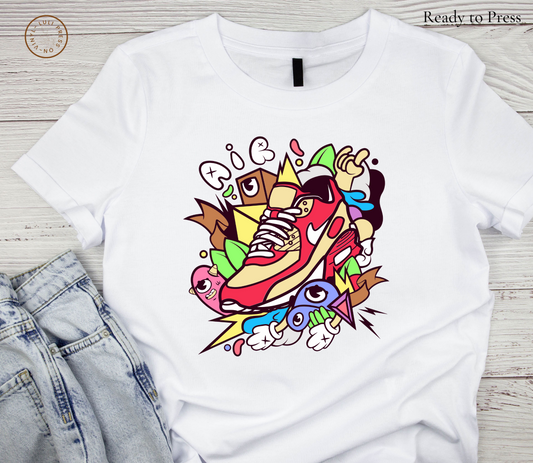 White shirt showcasing colorful DTF transfer design for shoes
