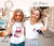Chanel Pink Love Logo in DTF Transfers printed on a white t-shirt of two girls